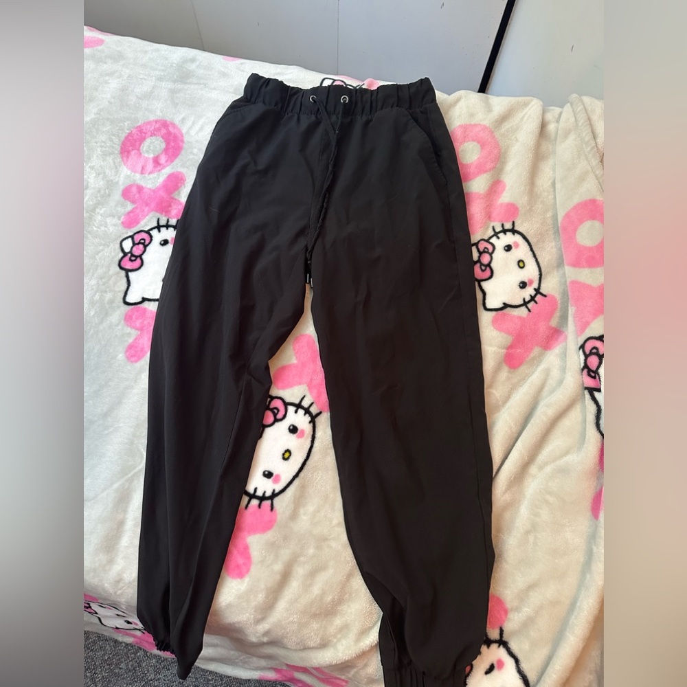 Women’s Ardene black pants: smooth stretch joggers size medium